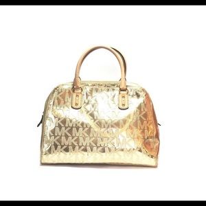 Michael Kors MK gold embossed handbag
